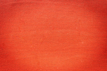 Maroon red fabric textile cloth for background texture or graphic design purposes.
