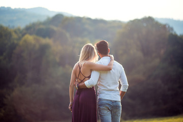 Rear view of a romantic young couple 