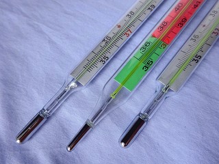Medicine Medical Health Care Industry Three Thermometers Laying On The Clear Soft Light Blue Background With Copy Paste Text Space 
