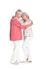 happy senior couple posing on white background