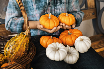 Closeup Of Child And Pumpkins In Autumn