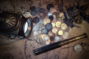 Fototapeta na wymiar Ship lantern, compass, old coins and sextants. Travel and marine engraving background.Pirate map. Retro style.