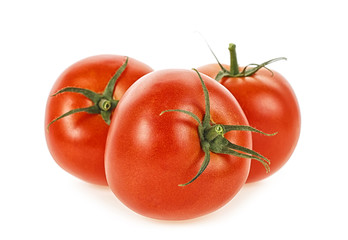 Three ripe tomatoes isolated on white background