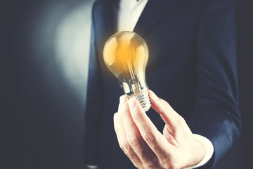 man hand light bulb or idea