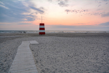 Red-white lifeguard tower on the beach of Henne Strand, Jutland Denmark Europe