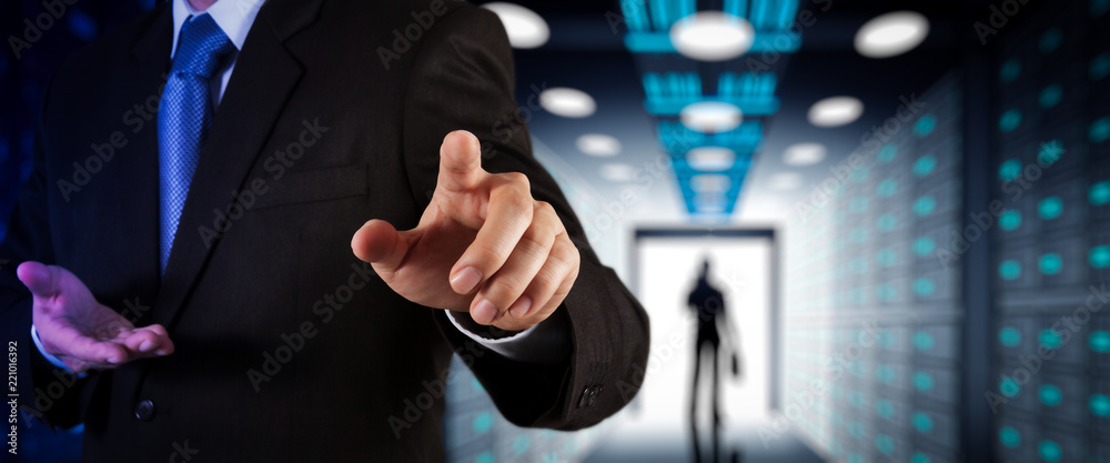 Poster Businessman working with VR wide blank screen computer on server room in background.