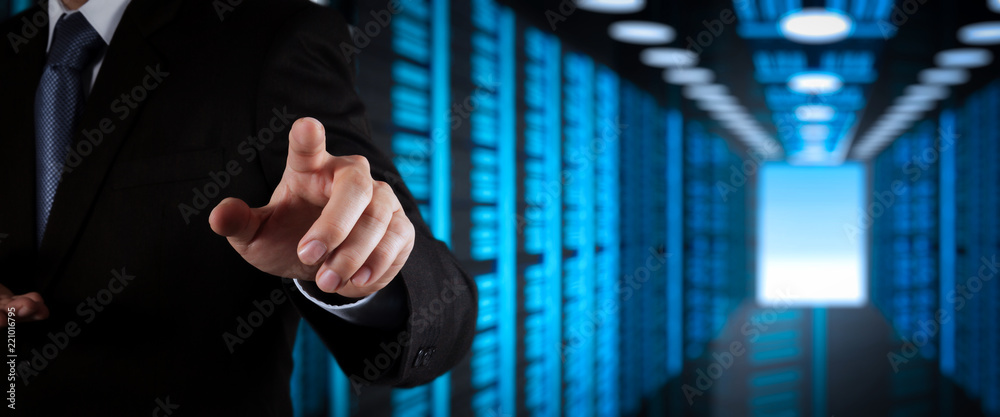 Poster Businessman working with VR wide blank screen computer on server room in background.
