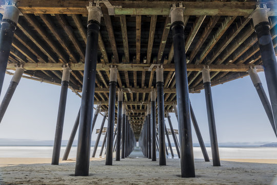 A Shot From Underneath A Pier In Pismo Beach