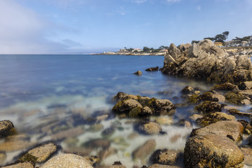 Fototapeta na wymiar A long exposure of the coastline in Morro Bay, California
