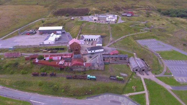 An aerial view of an Old Coal Mine Pit Yard on overcast Day, Blaenavon, Wales