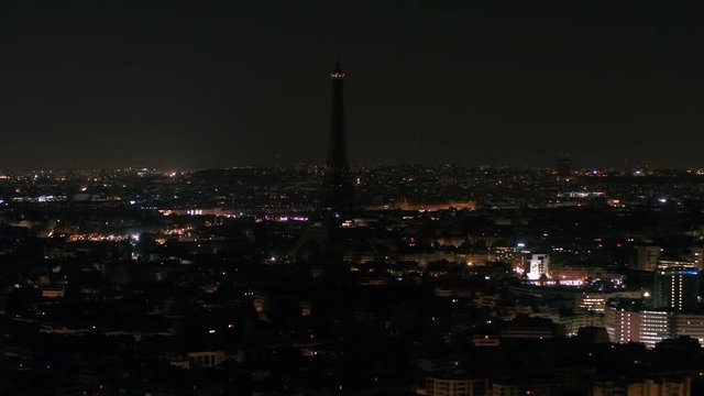 Aerial France Paris Eiffel Tower August 2018 Night 90mm Zoom 4K Inspire 2 Prores

Aerial video of the Eiffel Tower at night with a zoom lens in Paris France. Eiffel Tower with blue sparkling lights.