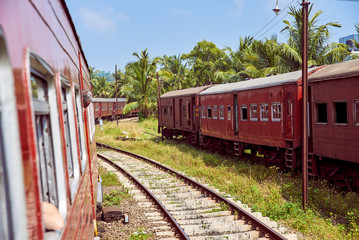 Fototapeta premium two old red train near