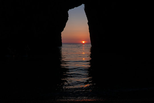 Arcomagno (Arco magno) at sunset, natural arch in San Nicola Arcella, Calabria, Italy