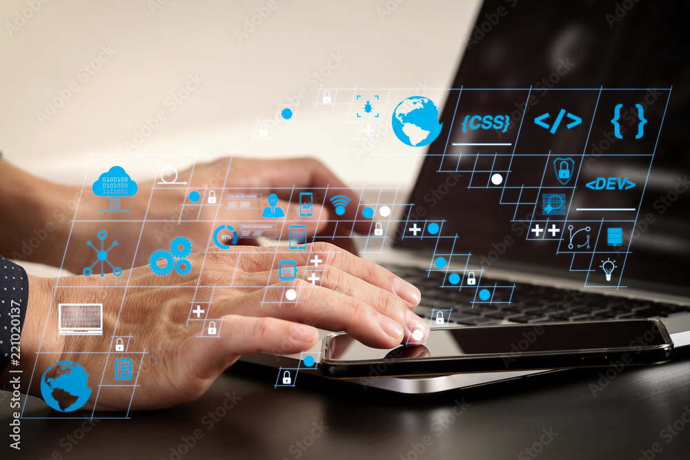 Poster close up of businessman hand working with smart phone and laptop and digital tablet computer in modern office
