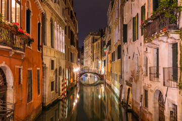 Fototapeta na wymiar Venetian water сanal at night in Venice, Italy.