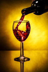 Fototapeta na wymiar Bottle and wine glass