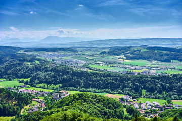 Backlands and woods of Zurich in Switzerland / View over Cantons of "Aargau" and "Zug" with alps in the background