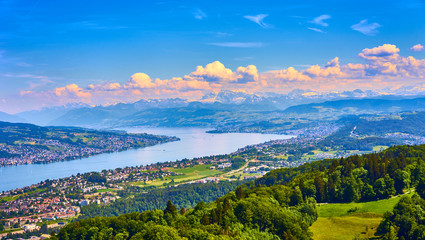 Panoramic view over Lake of Zurich in Switzerland / Alps in the background - obrazy, fototapety, plakaty