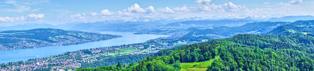 Fototapeta premium Panoramic view over Lake of Zurich in Switzerland / Alps in the background