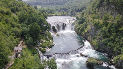 Fototapeta na wymiar Strbacki buk (Štrbački buk) waterfall is a 25 m high waterfall on the Una River. It is greatest waterfall in Bosnia and Herzegovina.