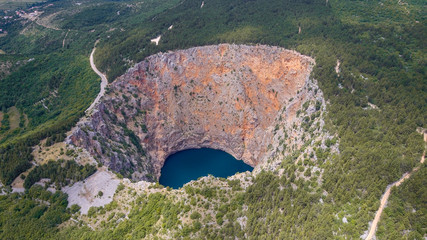 Red Lake (Croatian: Crveno jezero) is a collapse doline (collapse sinkhole) containing a karst lake...