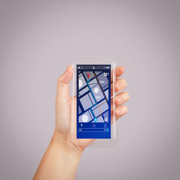 Close up of Tourist using GPS map navigation on smartphone application screen for direction to destination address in the city with travel and technology concept.