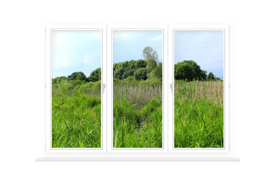 Window isolated with view to summer field. Rural view