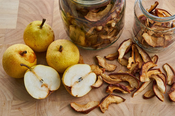 Dried pears close up, traditional preservation of riped fruits, mainly pears, apples or plums, to keep nutritions and vitamins for winter, use for cooking or light snack