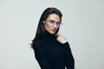 Confident woman in black outfit
