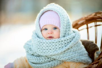 Winter portrait of little girl in fur coat - 221032777