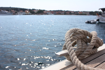 Sail boat on blue water