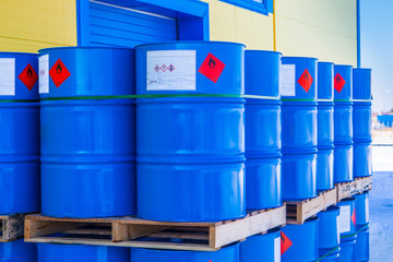 Barrels. Warehouse of chemical products. The metal barrels are blue. Chemistry. Manufacture of...