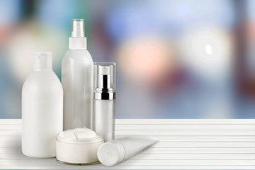 Cosmetic containers isolated on background