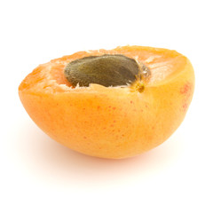 One apricot half isolated on white background cutout