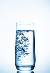 water glass on blue background