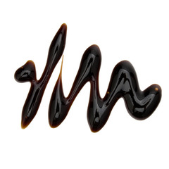 Balsamic vinegar cream isolated on white background. Italian salad dressing, sauce.