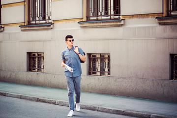 young and confident businessman on the street