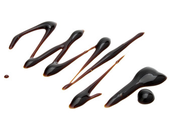 Obraz premium Balsamic vinegar cream isolated on white background. Italian salad dressing, sauce.