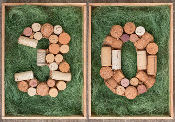 Number 30 thirty made of wine corks on green background in wooden box