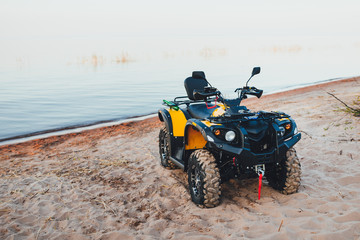 quad bike ATV, lake background