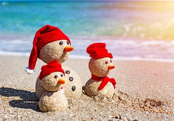 Sandy snowmen. Holiday concept can be used for New Year's and