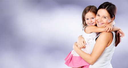 Happy Mother and daughter hugging