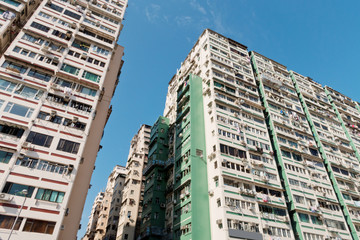 Fototapeta na wymiar Residential buildings in Yaumatei, Hong Kong. Hong Kong is one of the most densely populated places in the world.