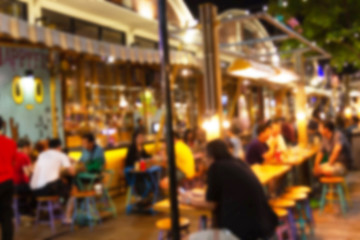 Fototapeta na wymiar abstract blur image of night festival in a restaurant and The atmosphere is happy and relaxing with bokeh for background, Bangkok Thailand.