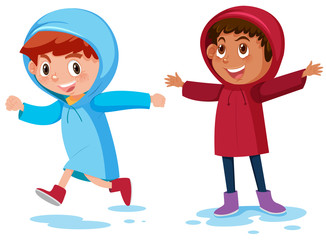 Happy boys wearing raincoast