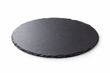 Black round stone plate with white background