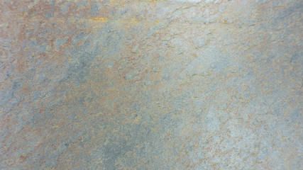 Rust stone wall or grunge, natural pattern, bronze wall, lighting abstract texture background design layout.