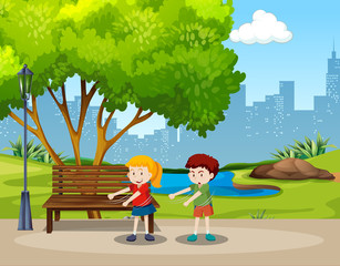 Obraz na płótnie Canvas Boy and girl floss dance in the park
