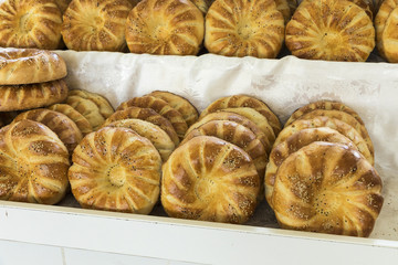 Traditional uzbekistan bread lavash at local bazaar, is a soft flat-bread of Middle Asia (Uzbekistan).