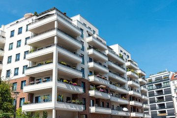 White apartment house with big balconies seen in Berlin, Germany